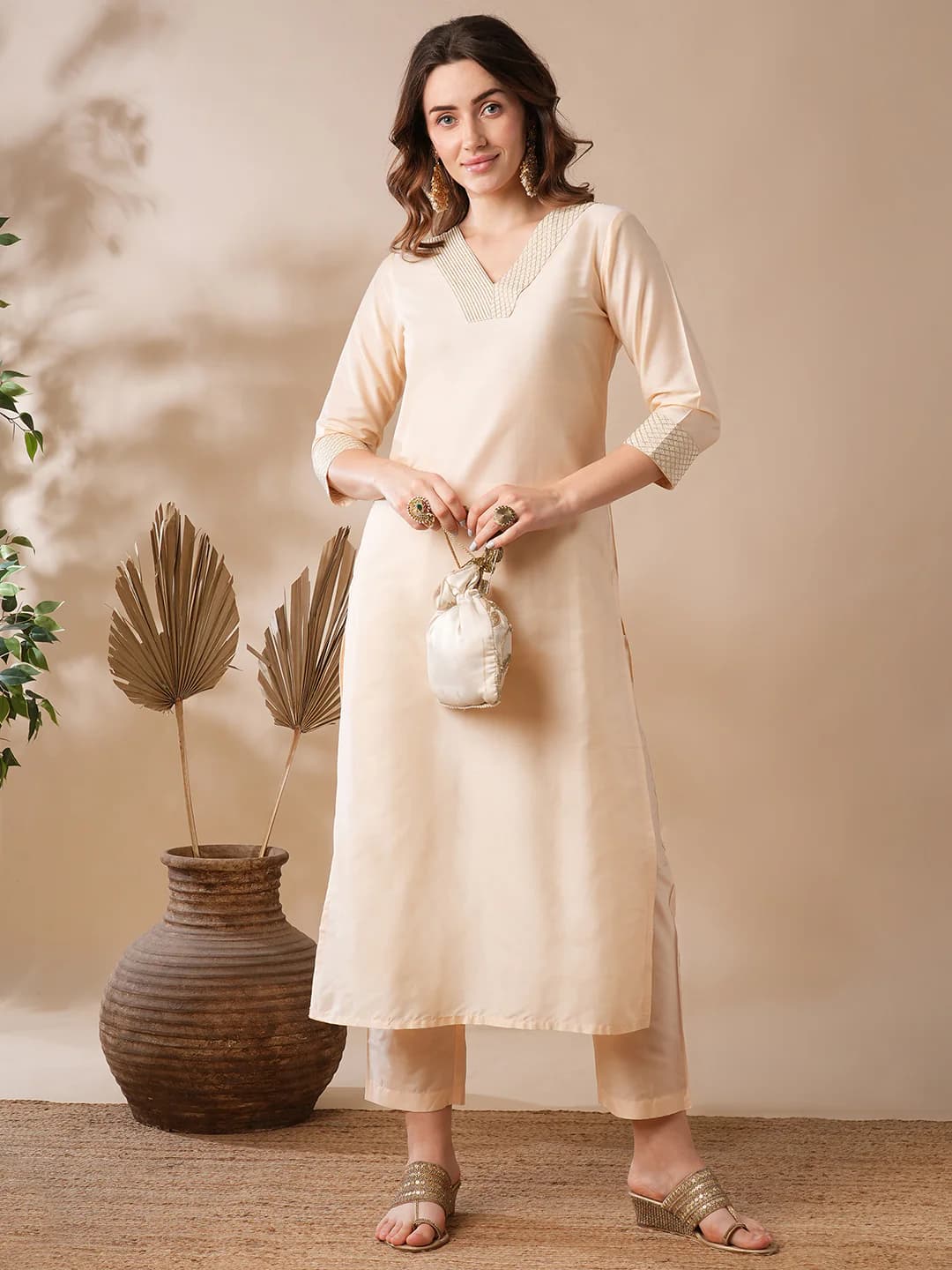 Women's Cream Work Embroidered Regular Fit V-Neck Shift Kurta and Solid Trouser