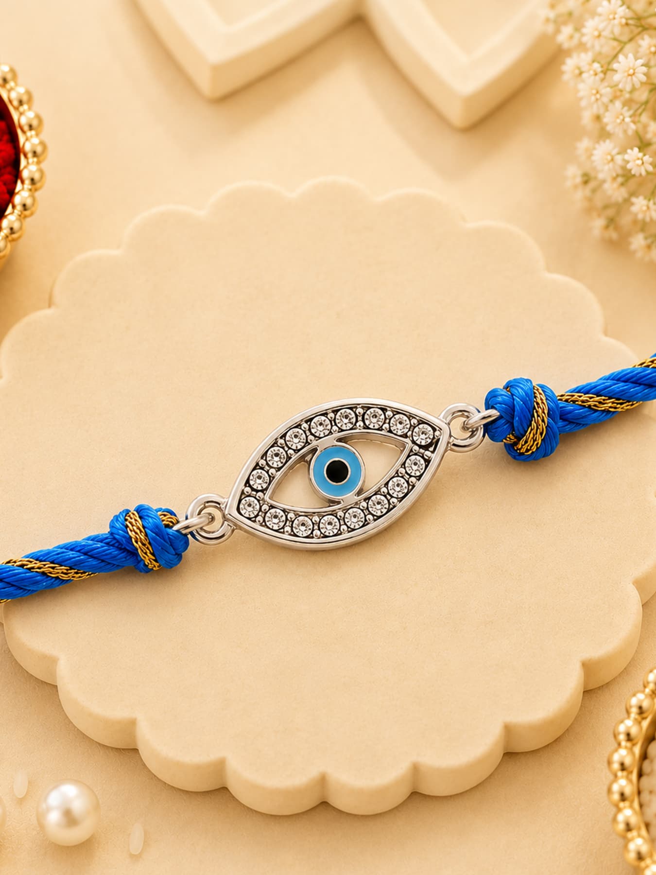 Unisex Rhodium Plated Auspicious Evil Eye Rakhi with Austrian Crystals and Fancy Silk Thread