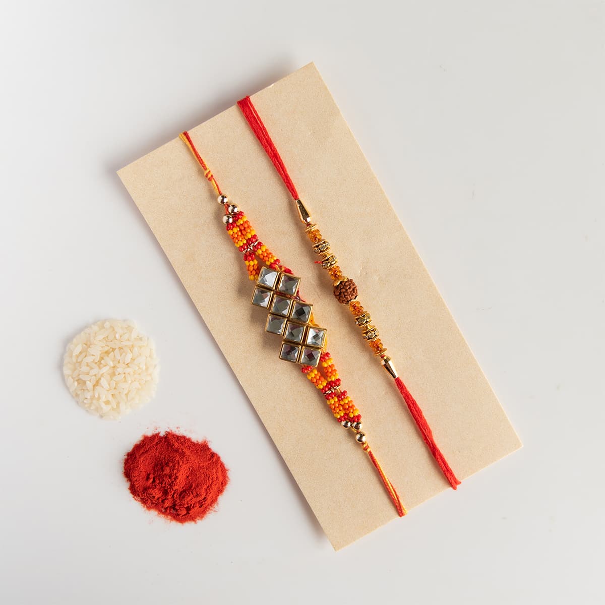 Men's White stones With Beats Rakhi combo set ( Pack of 2 )