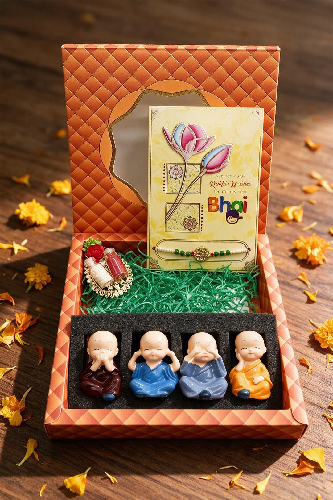 Rakhi Gift Hamper with Greeting Card Roli Chawal Metal Leaf & 4 Monk Sets